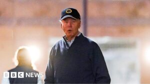 Biden ushered to safety after car crashes into motorcade