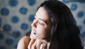 Here’s Why Your Teeth May Hurt When You’re Sick—And 4 Things You Can Do About It