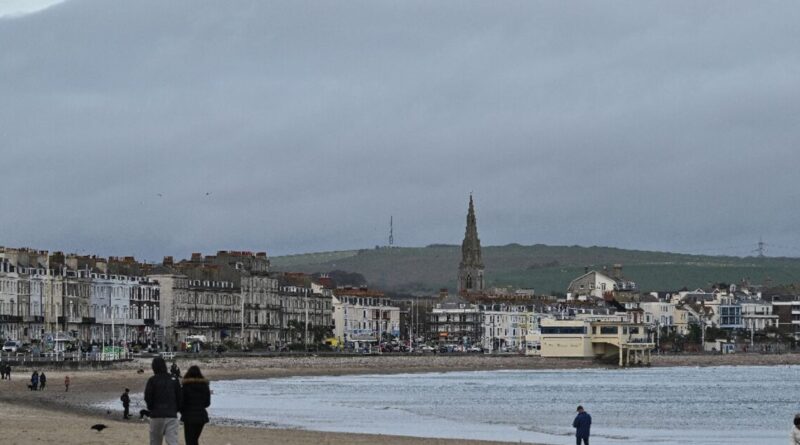 In UK seaside town, migrants call barge accommodation a 'prison'