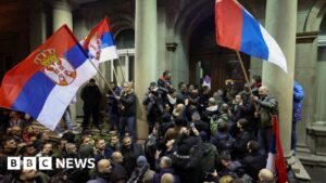 Serbia protests: Anti-government demonstrators try to storm Belgrade City Hall