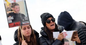 'We are here': Israelis talk to Gaza hostages on giant speakers
