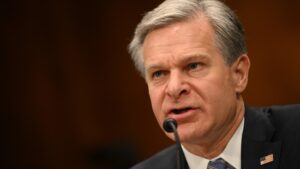 China and cybercriminals are targeting American AI companies, FBI Director Wray says