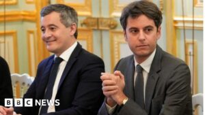 France's new PM tilts his cabinet to the right