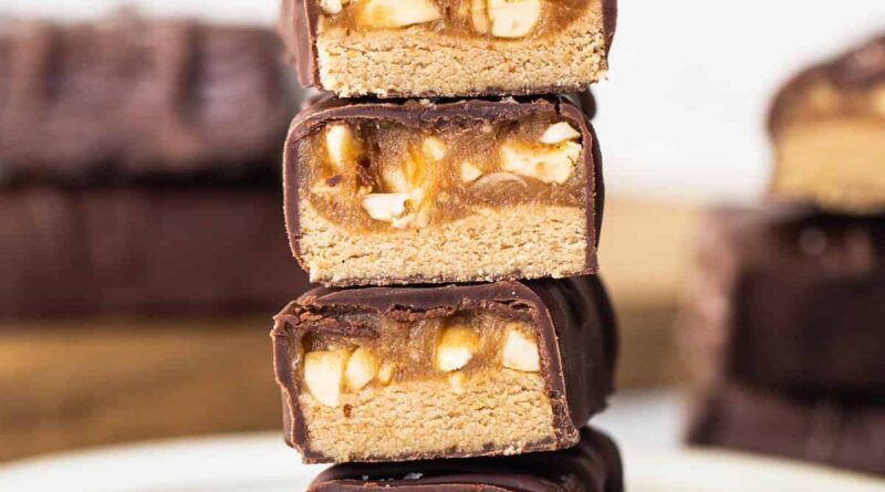 Peanut butter bars stacked on top of each other.