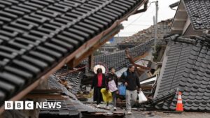 Japan earthquake: Woman in 90s found alive under rubble five days later