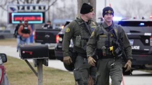 Police say multiple people have been shot at a high school in Perry, Iowa; suspect is dead