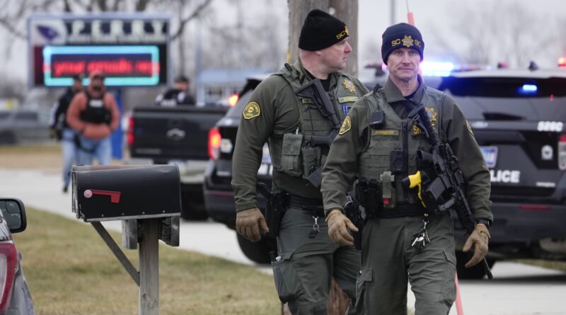 Police say multiple people have been shot at a high school in Perry, Iowa; suspect is dead