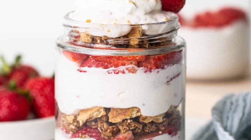 Strawberry granola parfait in a mason jar.