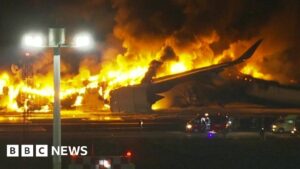 Watch: First pictures of plane on fire on Tokyo runway