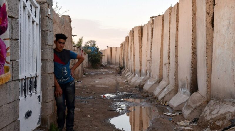 Years after civil war, security wall holds back Iraqi city