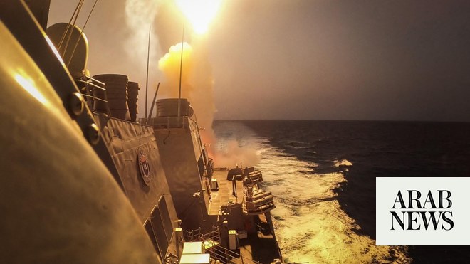 Yemen Houthi rebels fire a missile at a US warship