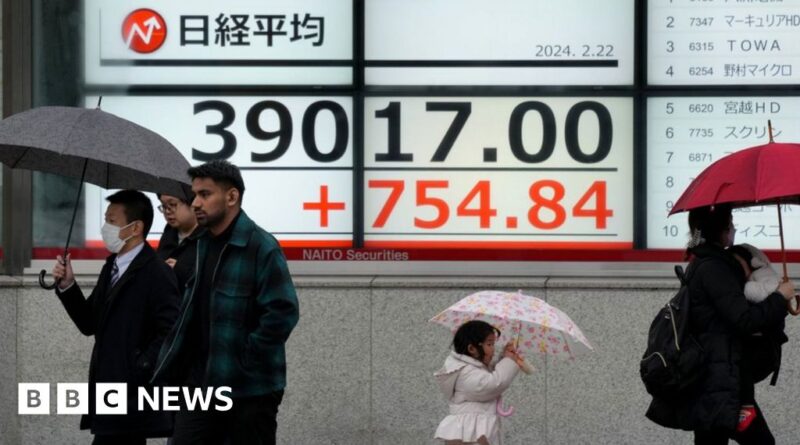 Japan's main stock index closes above 1989 record high