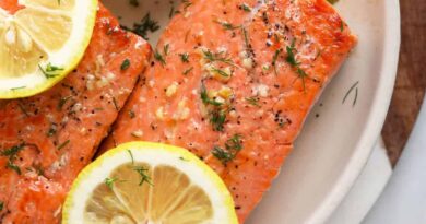 raw salmon on plate.