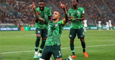 William Troost-Ekong (centre) celebrates scoring a penalty for Nigeria against South Africa at the 2023 Africa Cup of Nations