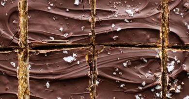 A close up of chocolate bars with sprinkles on them.