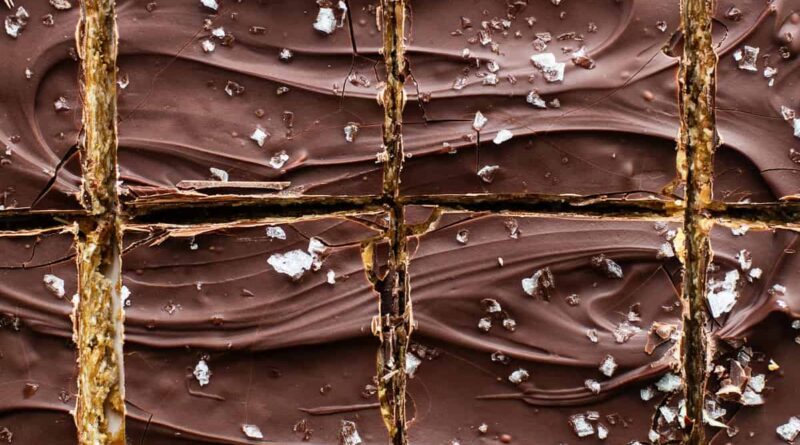 A close up of chocolate bars with sprinkles on them.