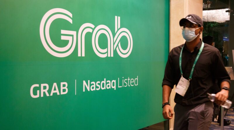 Ride-hailing giant Grab posts first profitable quarter, announces $500 million share buyback