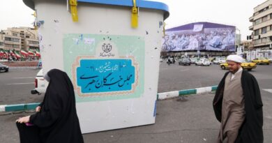 Iran's conservatives dominate elections marked by low turnout