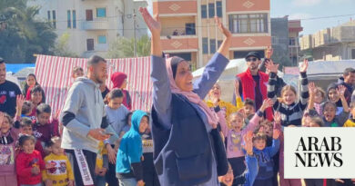 Palestinian Scout Association members volunteer to assist the displaced in war-ravaged Gaza