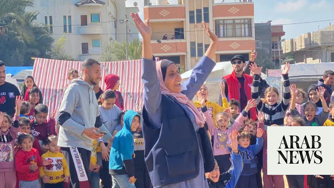 Palestinian Scout Association members volunteer to assist the displaced in war-ravaged Gaza