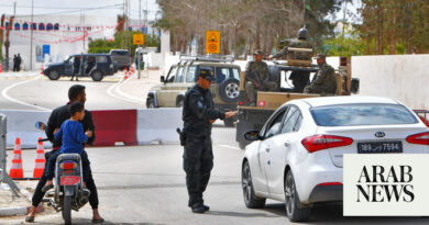 Tunisian authorities investigate a fire at a synagogue, question a suspect in custody