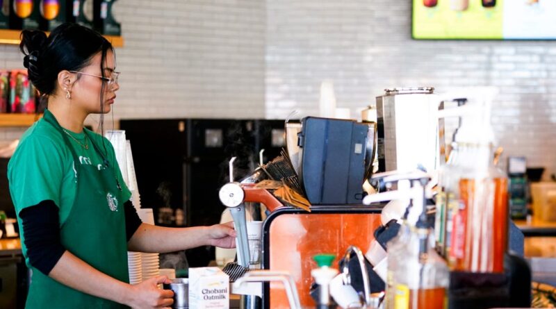 Starbucks is staffing up its stores with baristas and ditching machines in the latest stage of its turnaround