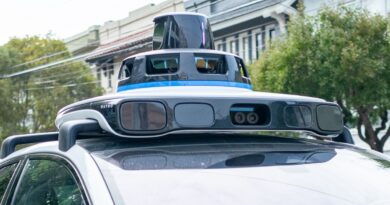 A Waymo self-driving car is seen in the Inner Richmond neighborhood of San Francisco, California, with the Lidar unit on the vehicle visible, November 17, 2024.