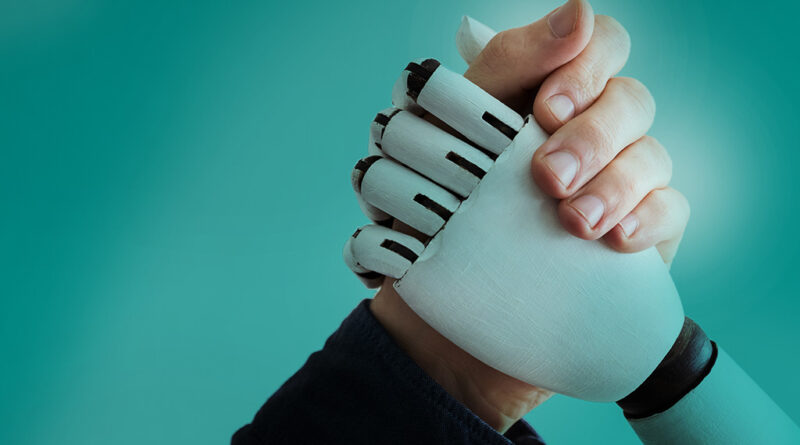 human hand an robot hand clasped for arm wrestling