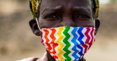 A woman wearing a mask, Malawi.