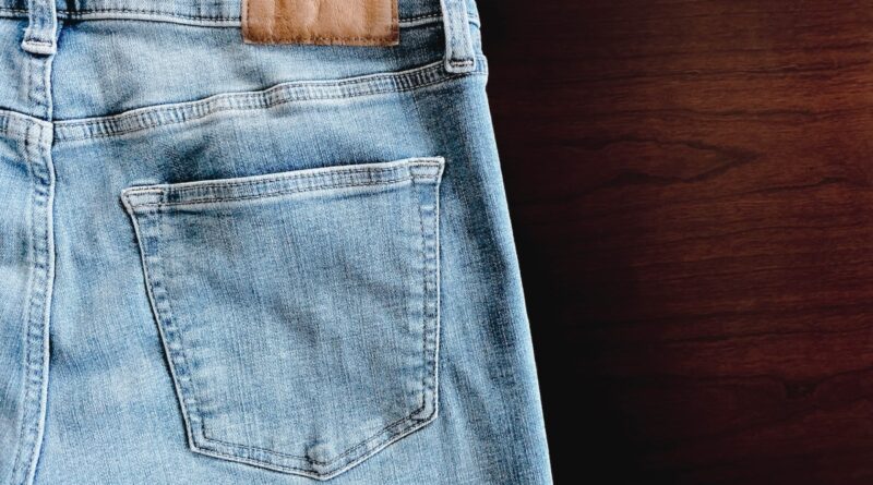 Close-up of back pocket on blue jeans