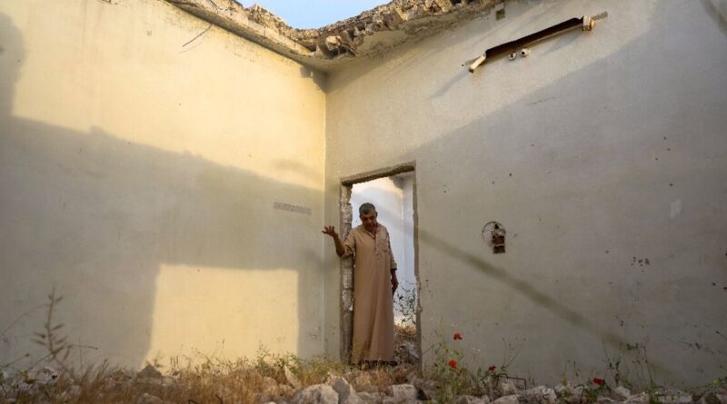 Displaced Syrians leave camps to pitch tents near destroyed homes