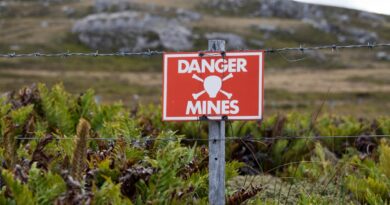 A sign warns people of landmines.