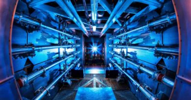 A light shines on laser preamplifiers at the National Ignition Facility.