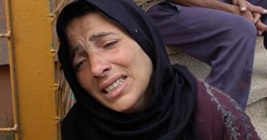 Gaza air strikes kill 94 as manhunt unfolds in West Bank