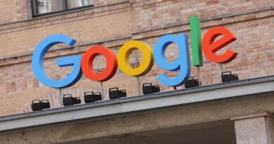 Google corporate logo hangs outside the Google Germany offices