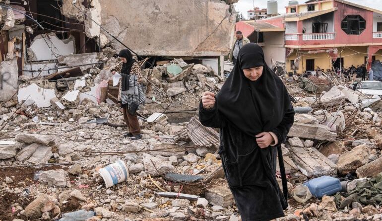 Ali Shaabi's Relatatives Stand Outside Their Homes Destroyed during the Ceasefire in Naqoura, South Lebanon