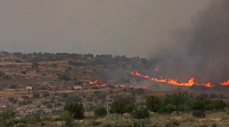 Israel brings fire near Jerusalem 'under control', reopens roads