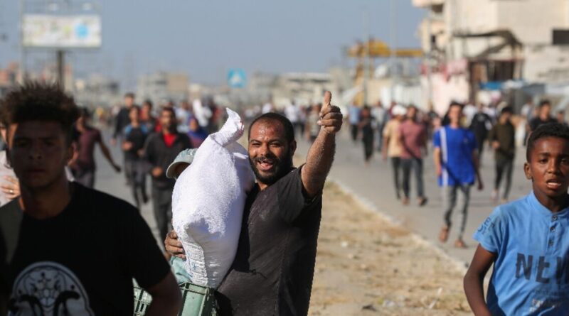 Thousands storm aid warehouse in Gaza as hunger crisis deepens