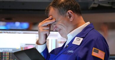 Treasurys hit 5% in wake of Moody's downgrade