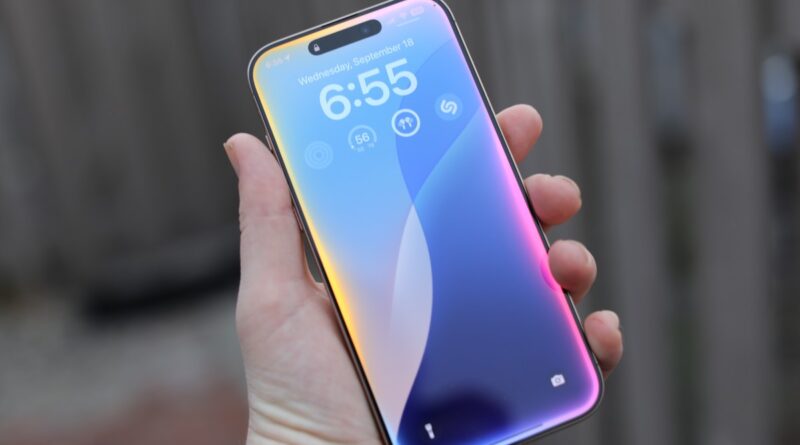 iPhone 16 Pro Max Siri held in hand