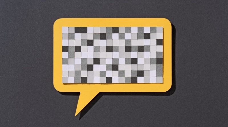 Paper Craft Pixel Mosaic Covering a Yellow Speech Bubble on Gray Background Front View, Censorship Concept.