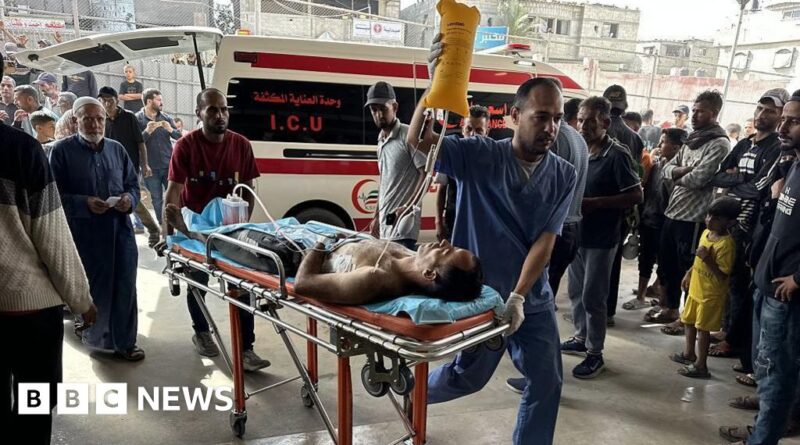 At least 27 Palestinians killed by Israeli fire near aid centre, Gaza authorities say
