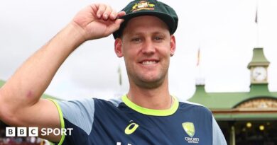 Australia cricketer Beau Webster touches the brim of his baggy green cap