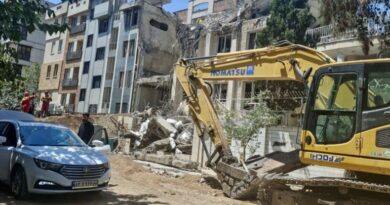 Heavily damaged building from an Israeli strike targeting the Narmak district in eastern Tehran.