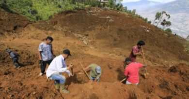 People search through debris and mud