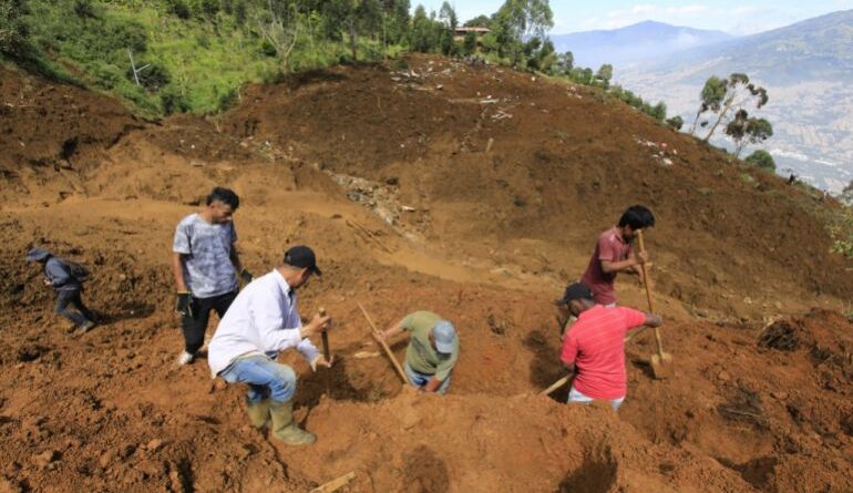 People search through debris and mud