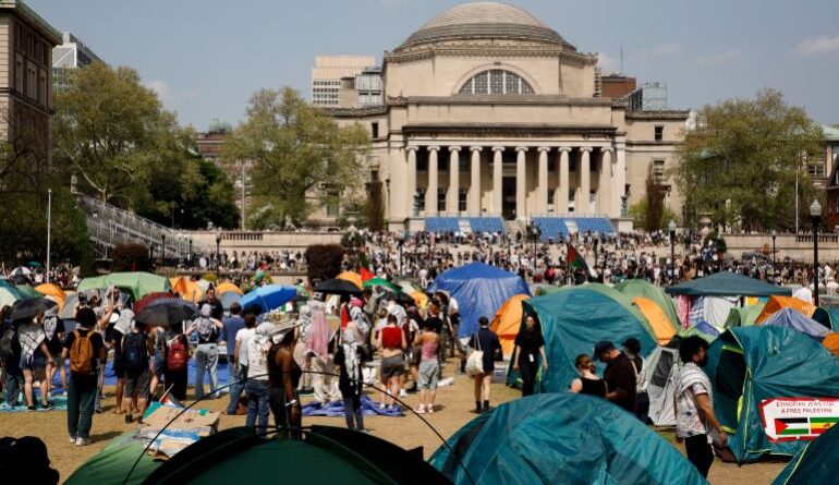 Student protesters gather inside their encampment on the Columbia University campus, on April 29, 2024