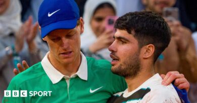 Carlos Alcaraz consoles Jannik Sinner following the French Open final