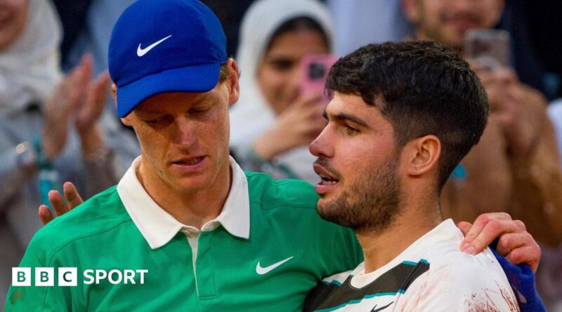 Carlos Alcaraz consoles Jannik Sinner following the French Open final