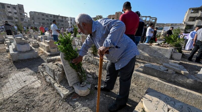 In Syria's devastated Jobar, cemetery comes alive for Eid